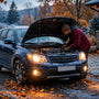 Car being winterized in a frosty autumn driveway