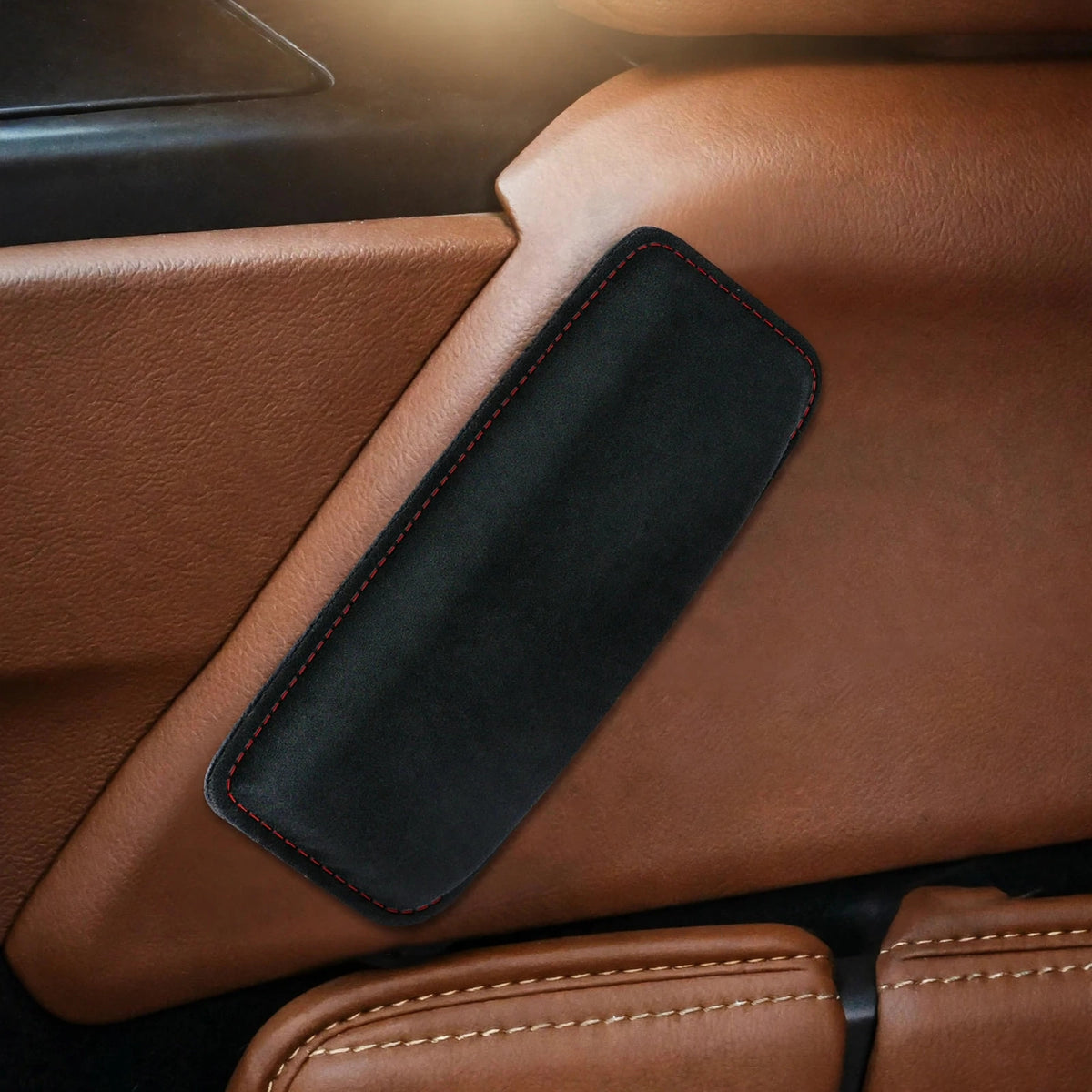 Knee cushion on car door panel